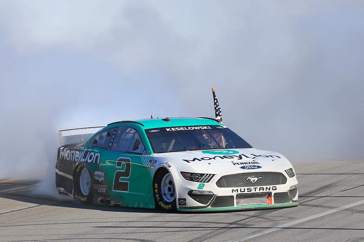 Brad Keselowski, Team Penske, Ford Mustang MoneyLion celebrates winning the 52nd Annual Geico 500 NASCAR Cup Series race on Sunday at Talladega Superspeedway in Talladega, Alabama.