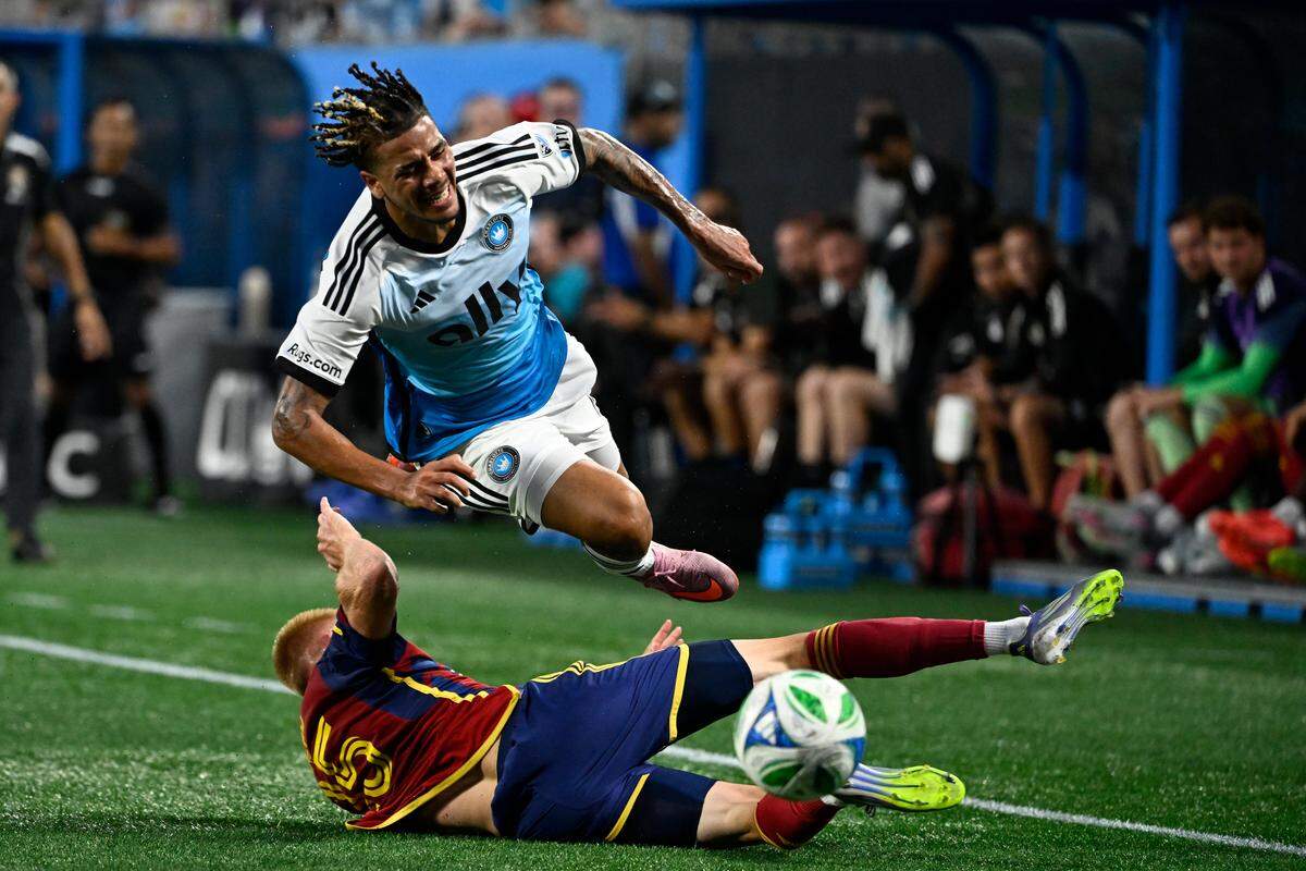 Charlotte FC forward Idan Toklomati (17) is fouled by Real Salt Lake defender Justen Glad (15) in the first half at Bank of America Stadium. 