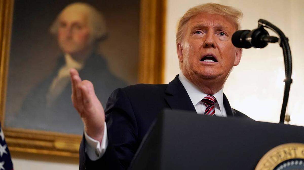 President Donald Trump speaks during a White House event Wednesday. In a forthcoming Bob Woodward book Trump says he downplayed the deadliness of the coronavirus because he didn’t want to cause “panic.”