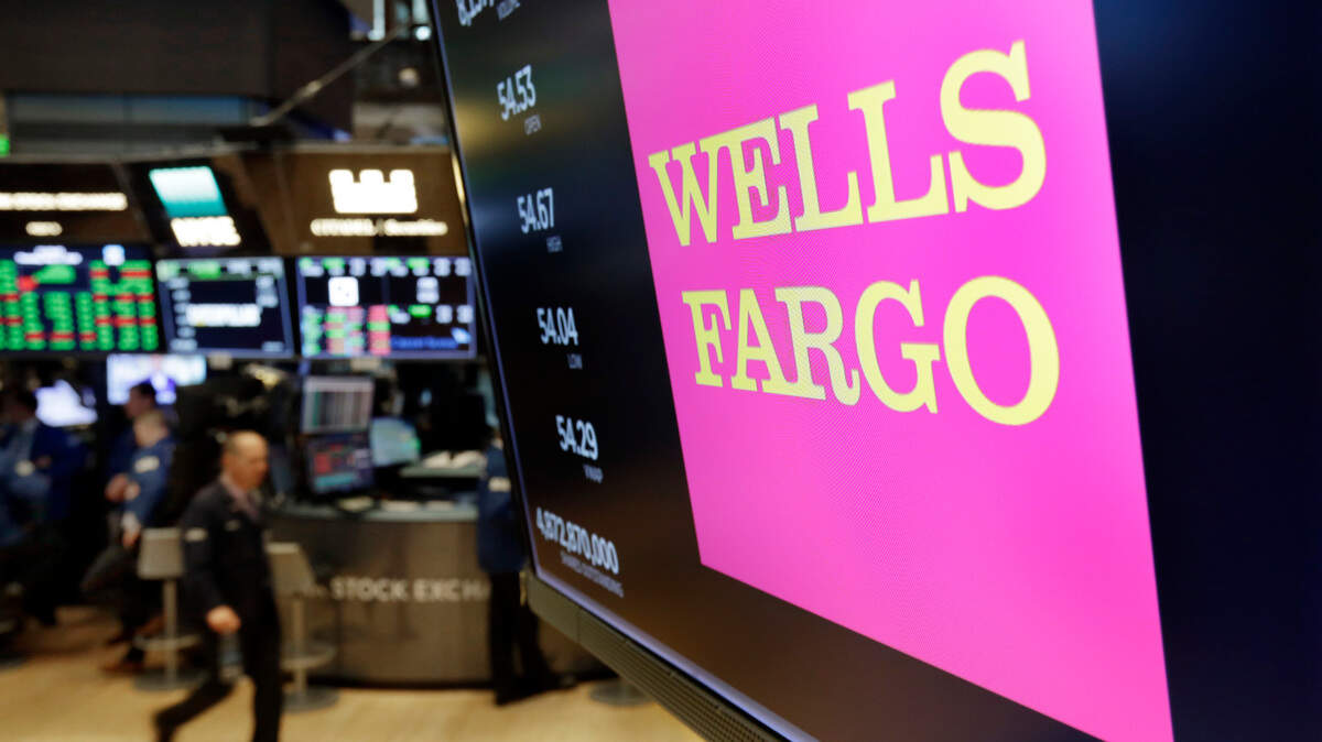 Wells Fargo said Friday its profit rose roughly 32 percent during the third quarter of this year from the same period a year ago, as the fourth-largest U.S. bank embattled by a series of scandals slashed its expenses. AP Photo/Richard Drew