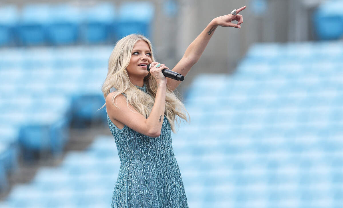 Davidson native Carter Faith opens the “Big Ass Stadium Tour” for Post Malone and Jelly Roll at Bank of America Stadium in Charlotte on Tuesday.
