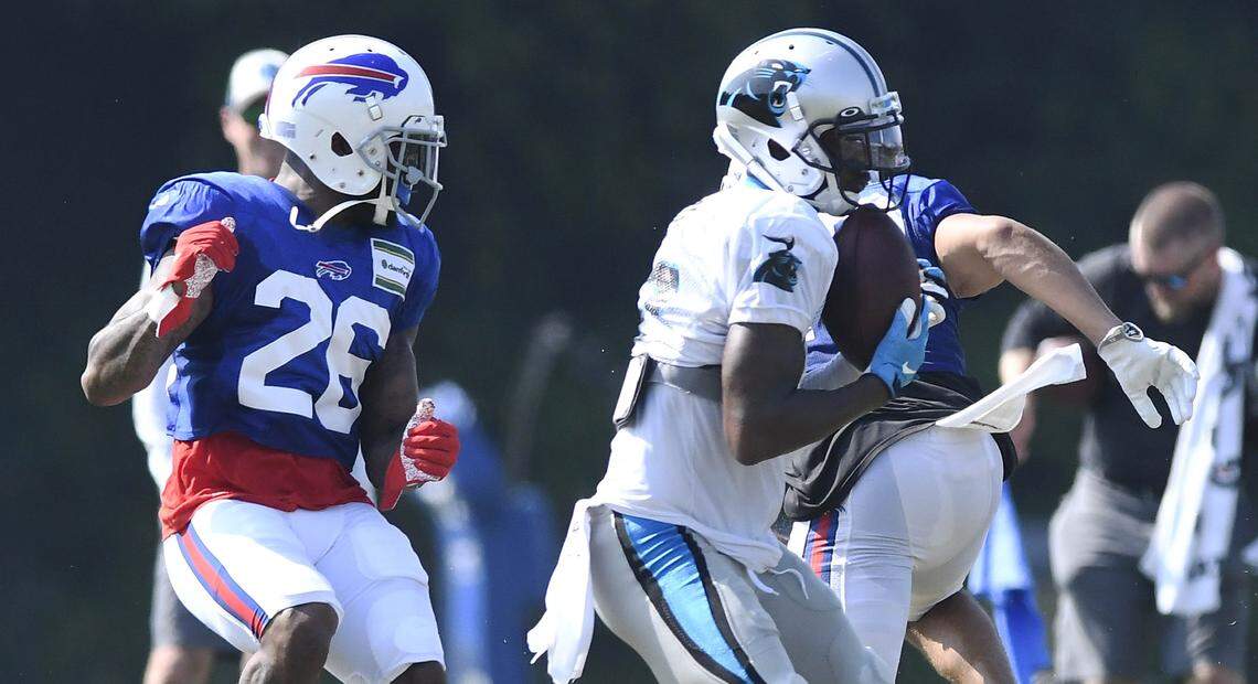Buffalo Bills defensive back Captain Munnerlyn (26) converges on Carolina Panthers wide receiver Terry Godwin (17) during a reception at their joint practice at Wofford College in Spartanburg, SC on Tuesday, August 13, 2019.