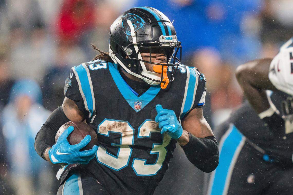 Carolina Panthers running back D’Onta Foreman (33) runs with the ball against the Atlanta Falcons during an NFL football game on Thursday, Nov. 10, 2022, in Charlotte, N.C. (AP Photo/Jacob Kupferman)