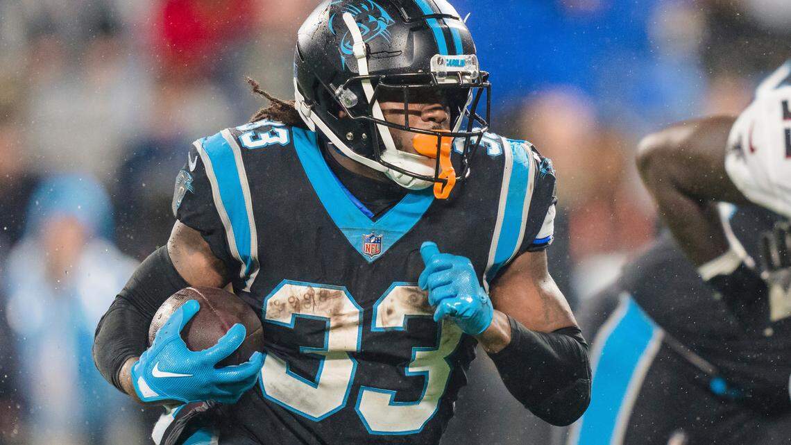 Carolina Panthers running back D’Onta Foreman (33) runs with the ball against the Atlanta Falcons during an NFL football game on Thursday, Nov. 10, 2022, in Charlotte, N.C. (AP Photo/Jacob Kupferman)