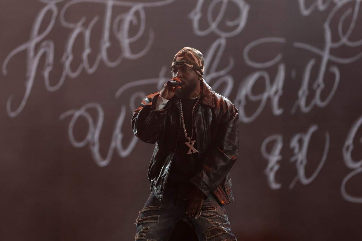 Kendrick Lamar performs his "Grand National Tour" in this photo provided by the artist.