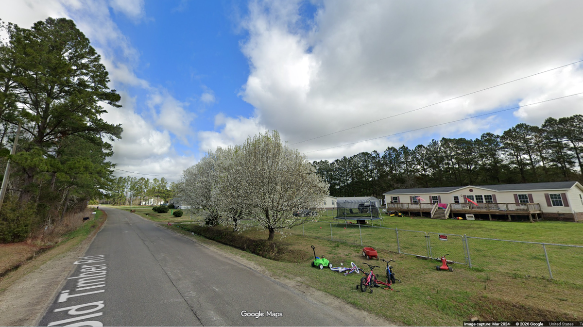 The boy was found dead in a container of water on the porch of a home in the 200 block of Old Timber road near Jacksonville, NC, officials say.