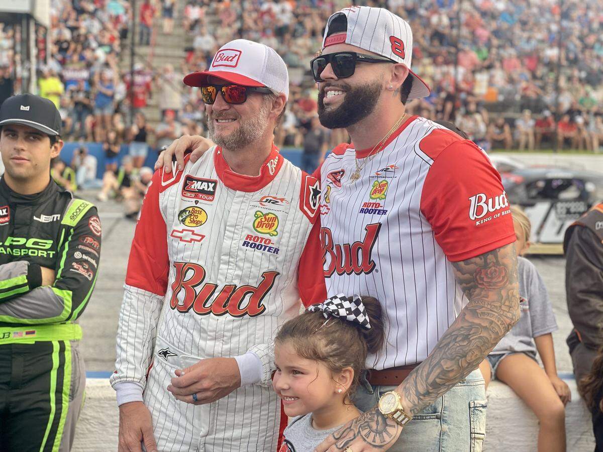 Dale Earnhardt Jr. hangs out on pit road ahead of the late model stock car race by the CARS Tour on Saturday, August 16, 2025, at Anderson Motor Speedway, where he showed off a throwback paint scheme.