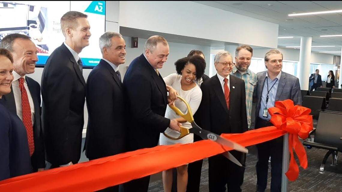 American Airlines and Charlotte officials celebrate the grand opening of four new gates at Charlotte Douglas International Airport Concourse A.