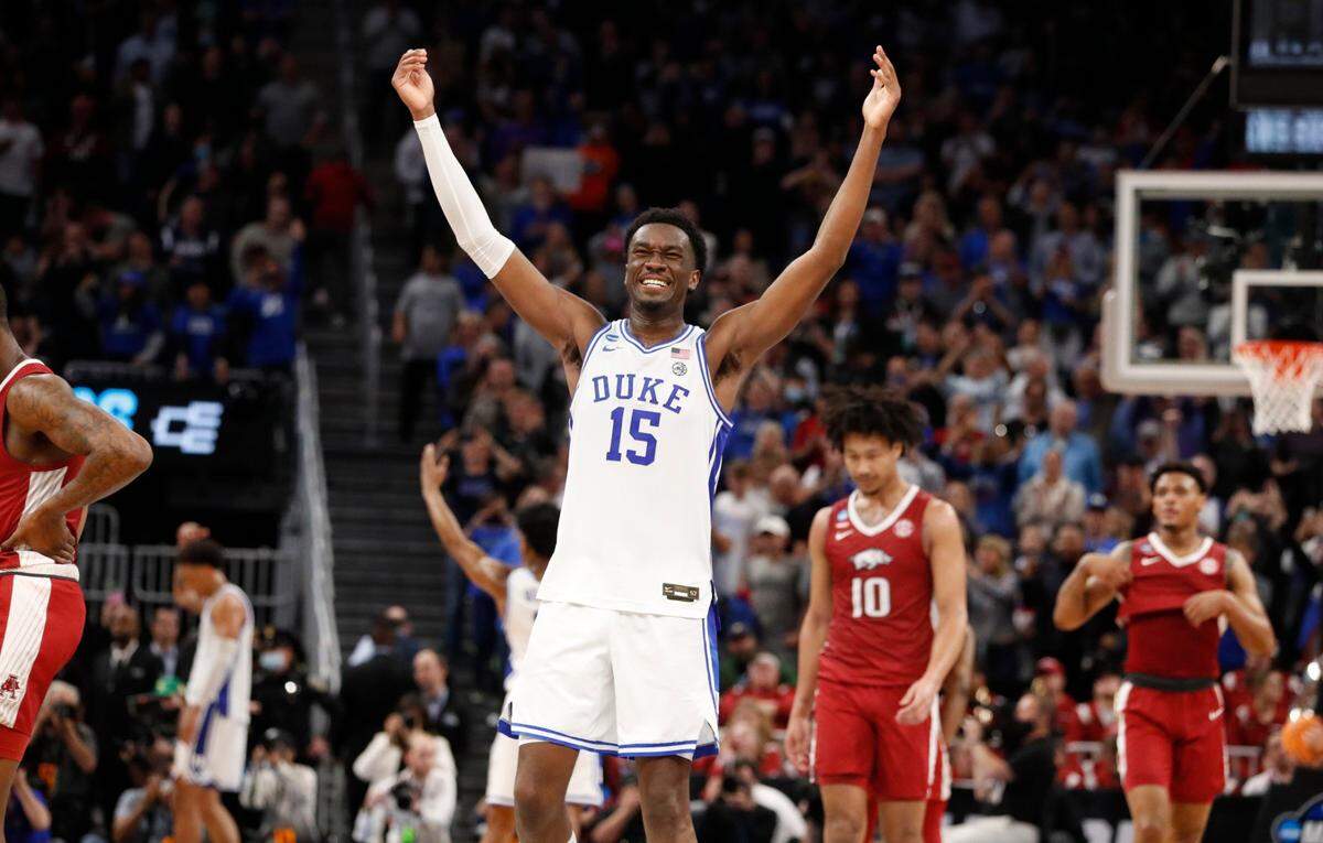 Duke’s Mark Williams (15) celebrates as time runs out in Duke’s 78-69 victory over Arkansas in the NCAA Tournament West Regional finals at the Chase Center in San Francisco, Calif., Saturday, March 26, 2022.