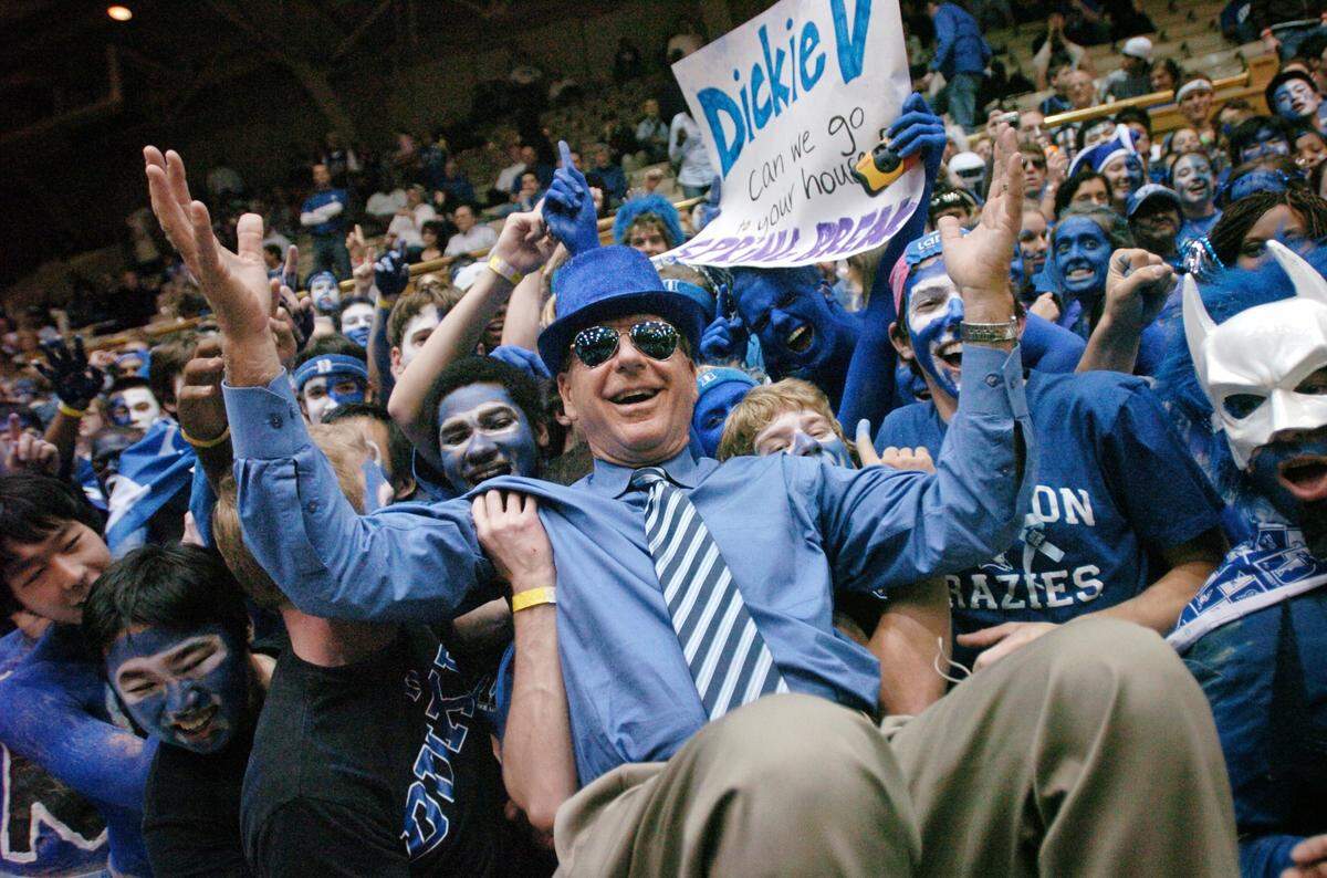 ESPN announcer Dick Vitale with Duke's Cameron Crazies at the Duke-North Carolina game on March 8, 2008. A new college basketball invitational named for Vitale will be contested in Charlotte on Tuesday between Duke and Texas.