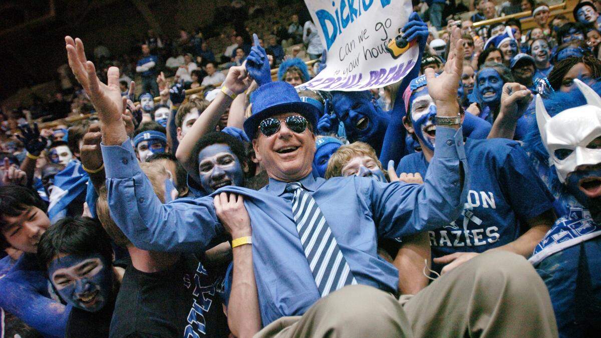 ESPN announcer Dick Vitale with Duke's Cameron Crazies at the Duke-North Carolina game on March 8, 2008 in Durham, N.C. A new college basketball invitational named for Vitale will be contested in Charlotte Tuesday between Duke and Texas.