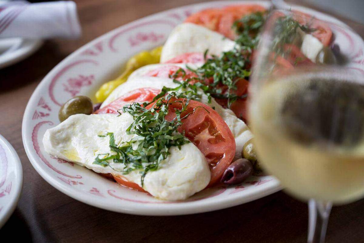 Caprese salad with house-made mozzarella at Mama Ricotta’s.
