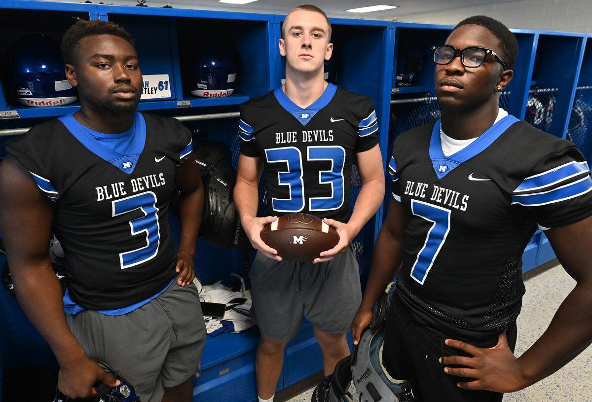 Mooresville High defensive linemen K.J. Gillespie, Jack Nelin and Jace McCallum on Monday, August 18, 2025. Mooresville High is expected to challenge for a league title this season.