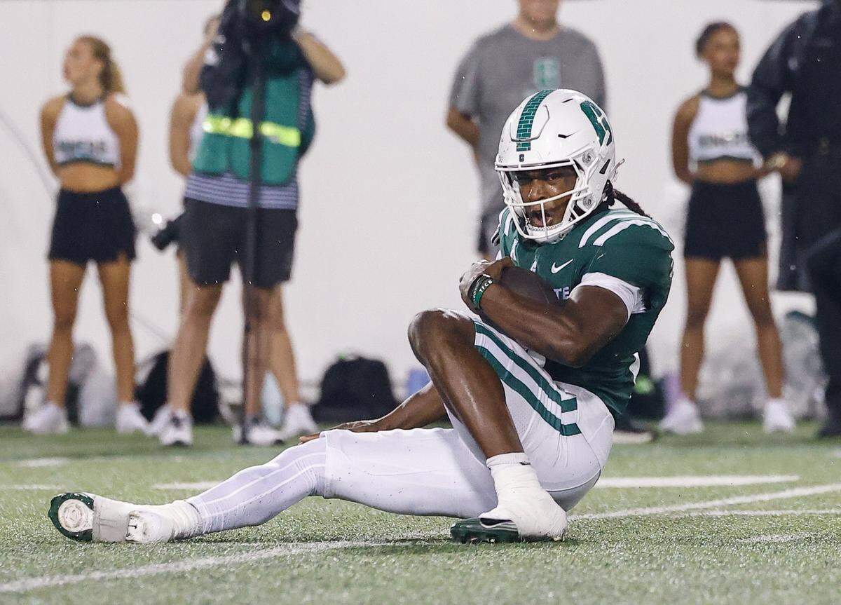 Charlotte quarterback Conner Harrell recovers a loose ball after the snap, losing yards on the play, during the game aginst UNC at Jerry Richardson Stadium on Saturday, September 6, 2025.