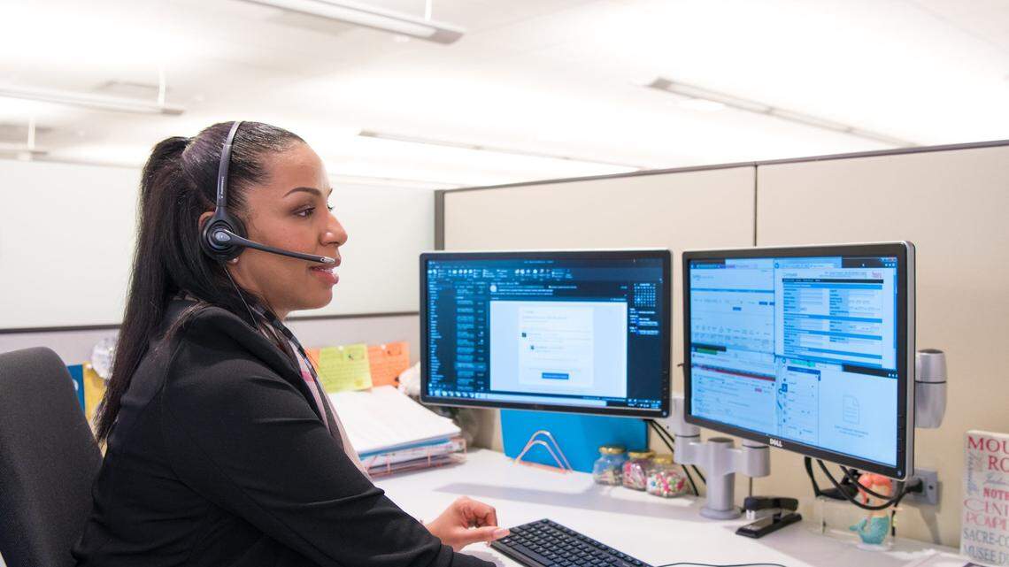 Natasha Barthelemy leads a team of hourly call center workers at Synchrony Financial’s offices in Charlotte. Barthelemy is one of thousands of employees across the U.S. who will benefit from Synchrony’s move to raise its minimum wage to $20 per hour.