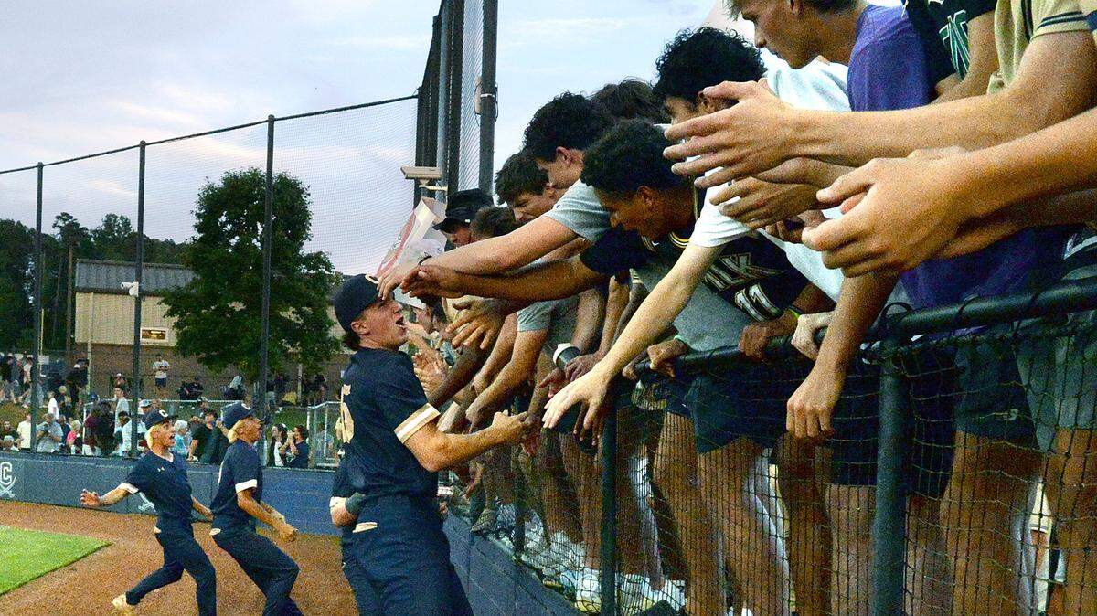 Cuthbertson fans rejoice with the team after the Cavaliers defeated T.C. Roberson 13-0.
The game ended after five innings with Cuthbertson winning game one 13-0.
The T.C. Roberson High School Rams traveled to Waxhaw to face off against the Cuthbertson High School Cavaliers for the first game of the NCHSAA Western Regional championship best of three series on Tuesday May 20, 2025.