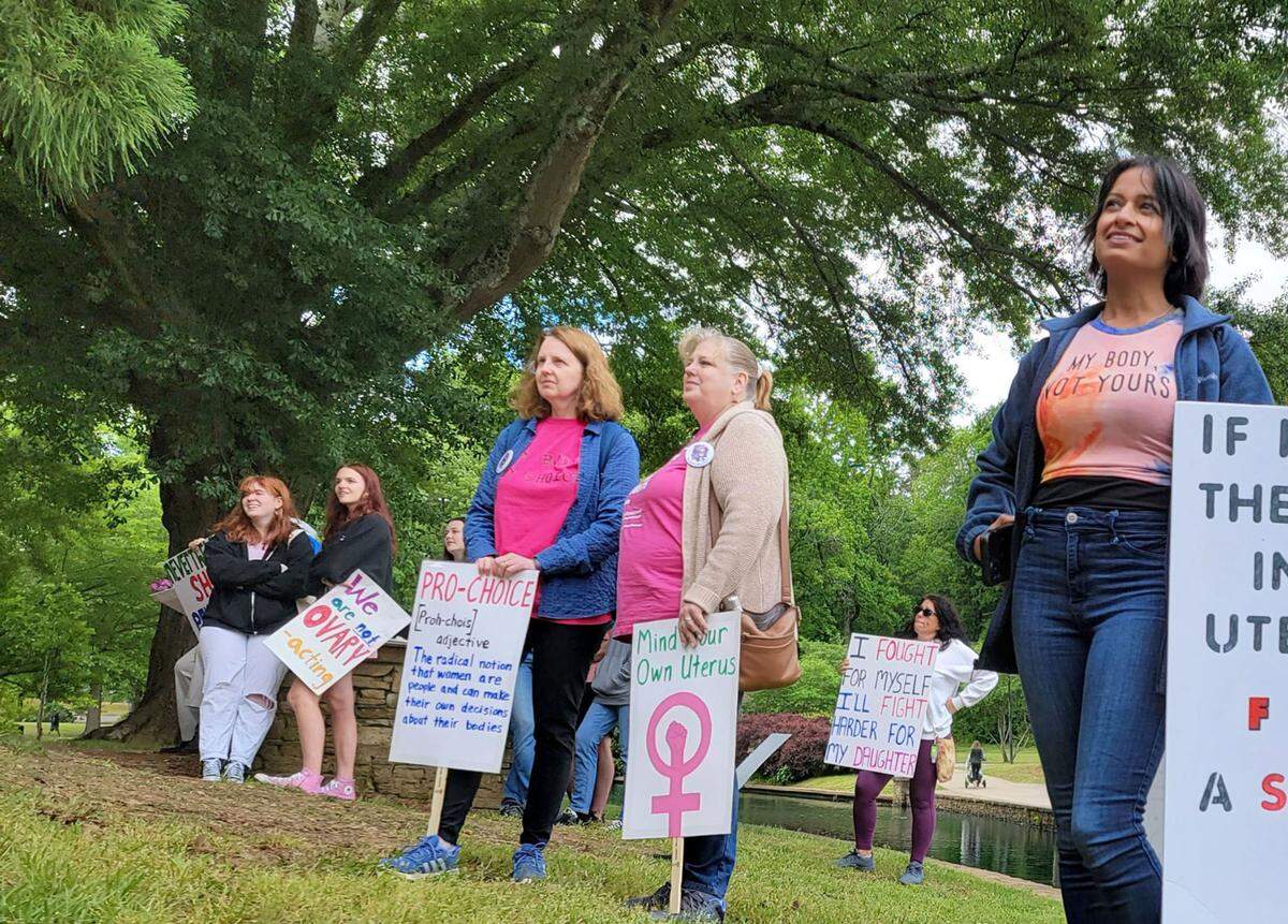 Protesters gather on Mother’s Day at Freedom Park in Charlotte on Sunday, May 8, 2022 to rally against a potential Supreme Court decision overturning Roe v. Wade.