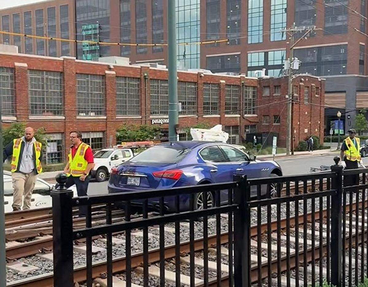 A car left on the tracks of the CATS Blue Line in South End on Monday disrupted commuter traffic before being cleared around 9:40 a.m.
