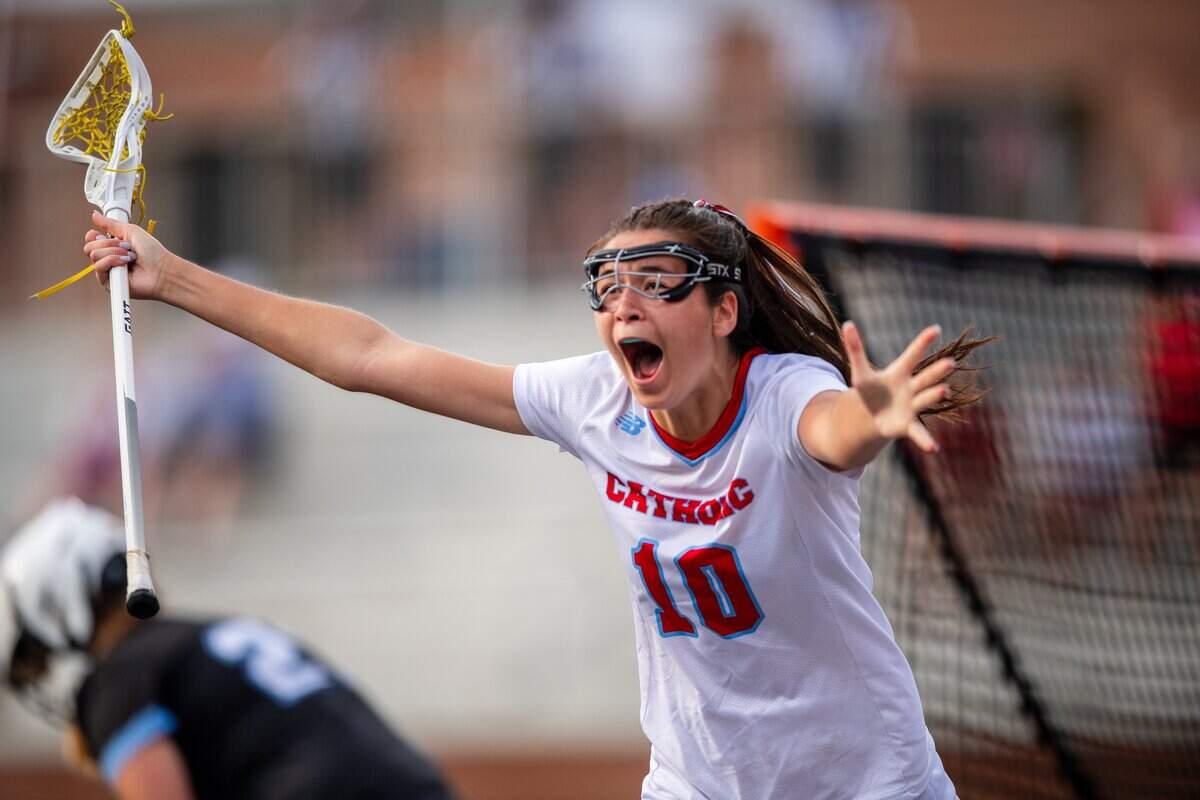 Charlotte Catholic's Sophie Tan celebrates scoring the game-winning goal against East Chapel Hill, giving Catholic the victory, 9-8, in sudden death overtime in the NCHSAA 1-6A state finals at Lenoir-Rhyne University in Hickory, North Carolina, on Friday, May 29, 2026.
