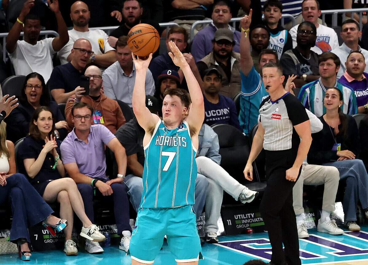 Charlotte Hornets forward Kon Knueppel releases a three-point shot during action against the Phoenix Suns at Spectrum Center in Charlotte, NC on Thursday, April 2, 2026. Knueppel set the team record for three pointers made during the game. The Hornets defeated the Suns 127-107.