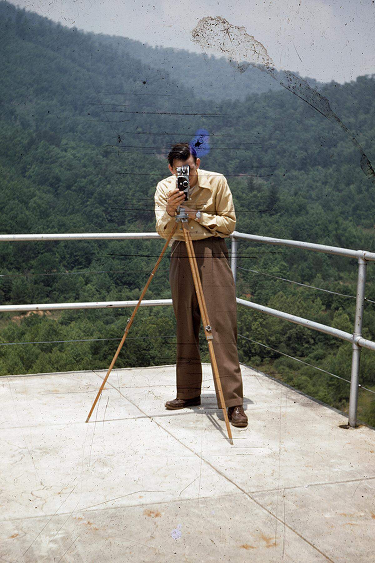 Neil Biggs behind his camera at Mount Mitchell. He began shooting photographs in the 1930s when he was a boy. He opened his family’s camera shop in 1959 and worked there until he was 92. He died Saturday at age 94.