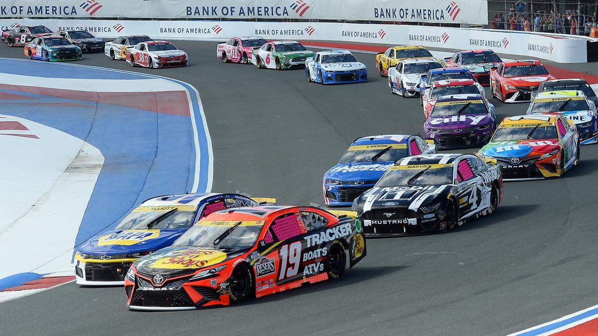 NASCAR driver pass through Turn 4 during the Bank of America Roval 400 at Charlotte Motor Speedway on Sunday, October 10, 2021. Drivers Chase Elliott (9) and Kevin Harvick (4) were later involved in a wreck.