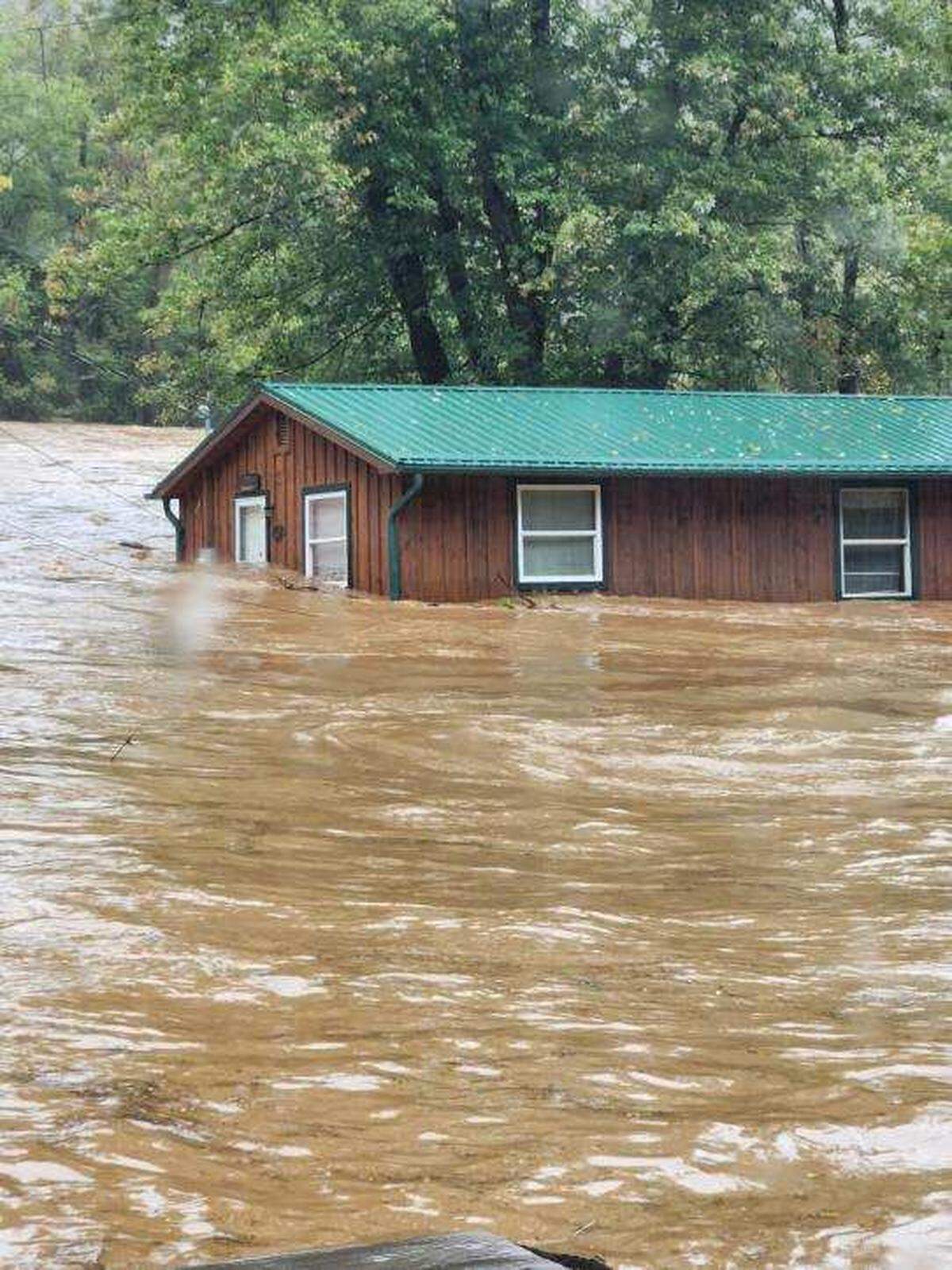 Tammy Coates and her husband watched their two-bedroom home in Marshall float down the French Broad River after Helene hit.