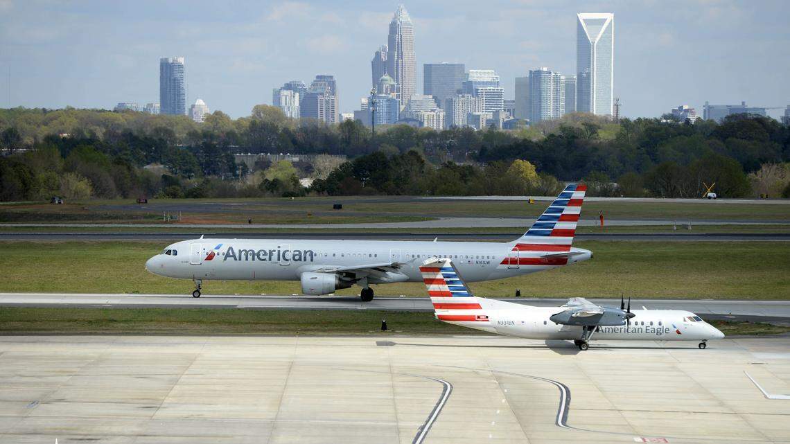 American Airlines airplanes taxi along at Charlotte Douglas International Airport on Wednesday, March 29, 2017. The FBI arrested an AA flight attendant from Charlotte on Thursday, Jan. 18, 2023, accused of trying to video-record a 14-year-old girl as she used a bathroom aboard a Charlotte-to-Boston flight on Sept. 2, 2023.