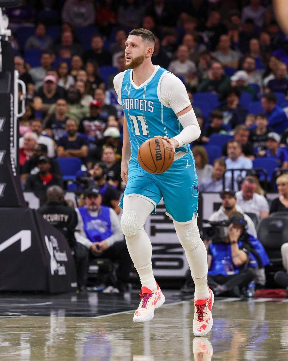 Charlotte Hornets center Jusuf Nurkic (11) brings the ball up court during Wednesday’s second quarter against the Orlando Magic at Kia Center. Mike Watters-Imagn Images