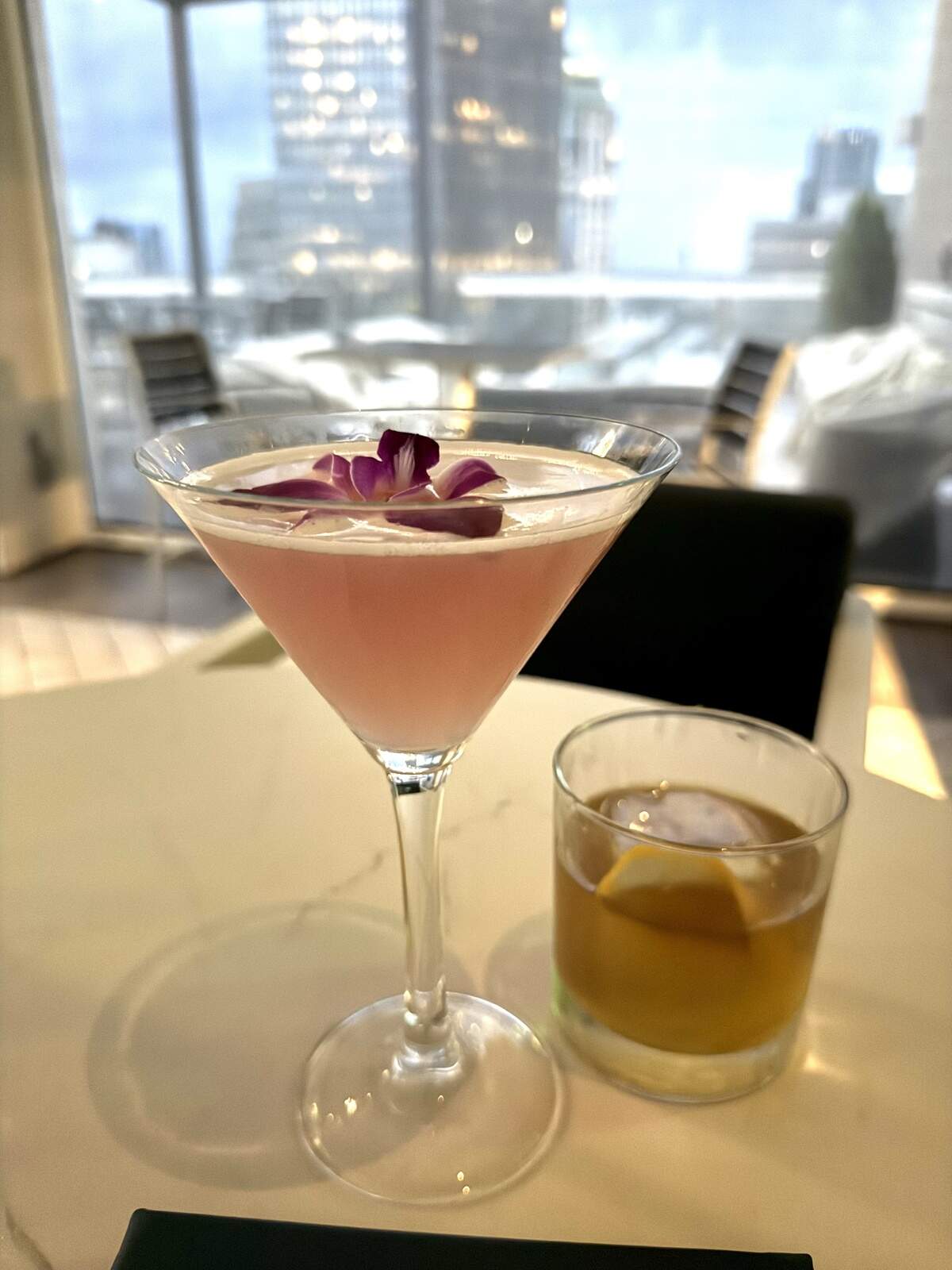 Nuvole Rooftop TwentyTwo’s First Bloom (Ketel One botanical grapefruit & rose, St. Germain, grapefruit bitters, cranberry syrup, grapefruit juice, lemon juice) and the Gold Standard, the restaurant’s take on an old fashioned (house-infused chamomile and orange bourbon, orange bitters, honey.)