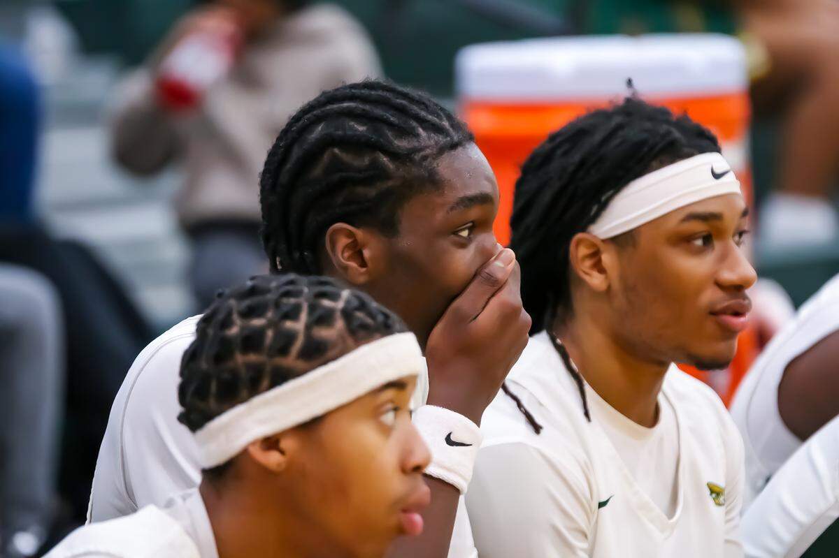 Independence High School’s Lusemo Macharia (center) has helped the Patriots to a five-game win streak and a first place spot in the Southwestern 4A heading into Friday’s game with rival Butler
