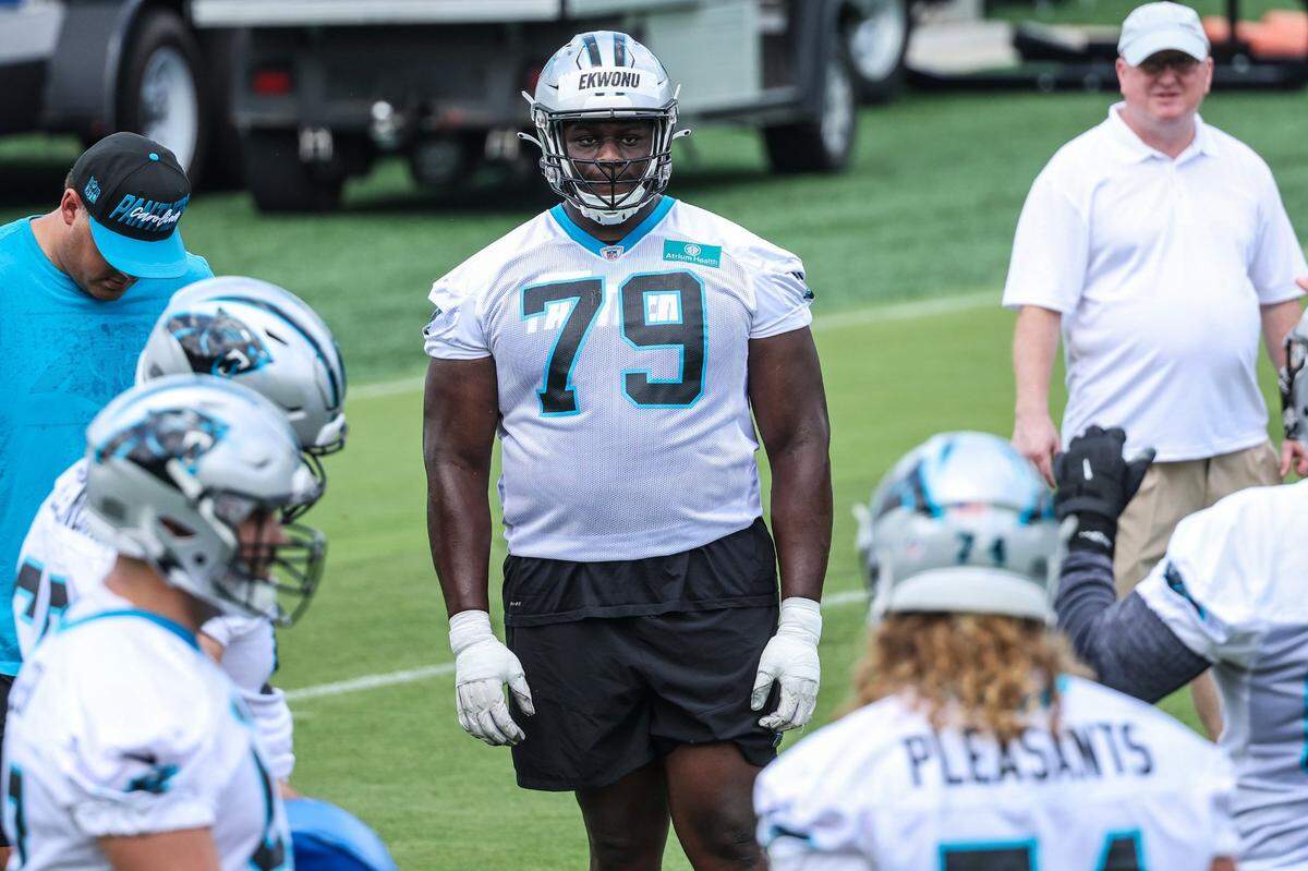 Panthers tackle Ikem Ekwonu, center, watches during individual position drills on day two of mini camp on Wednesday, June 15, 2022 in Charlotte, NC.