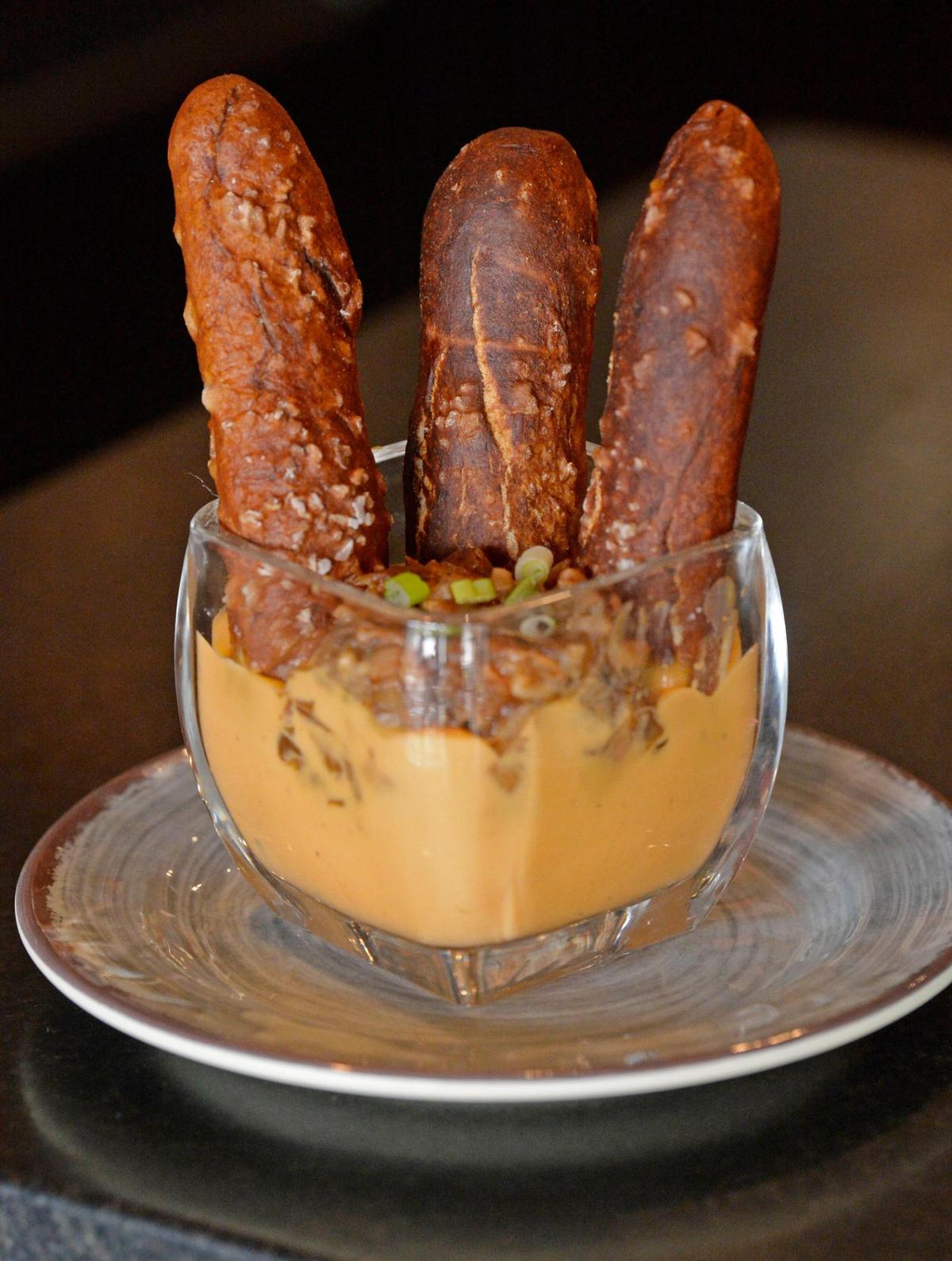 OMB beer cheese with homemade pretzels available at Fat Cat Burgers + Bake Shop.