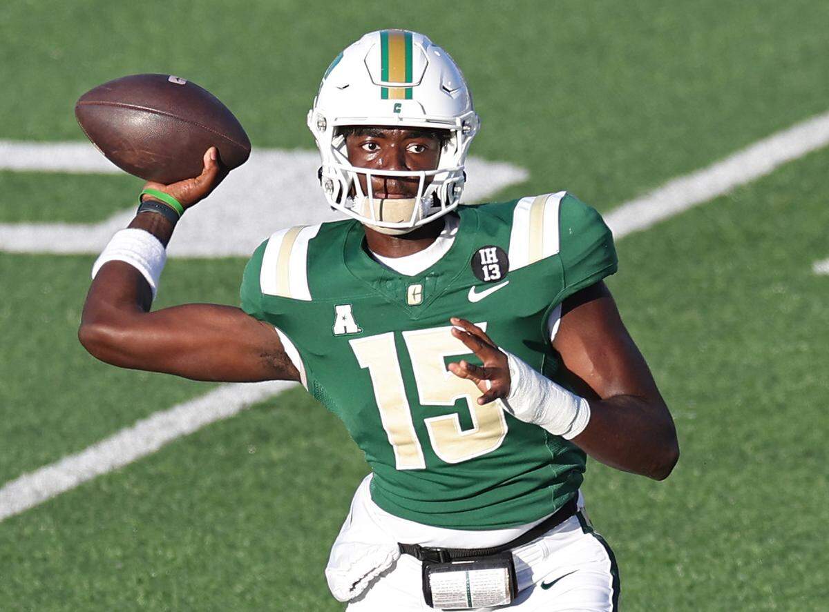 Charlotte 49ers quarterback Deshawn Purdie drops back to pass to a receiver during action against South Florida on Saturday, November 16, 2024 at Jerry Richardson Stadium.