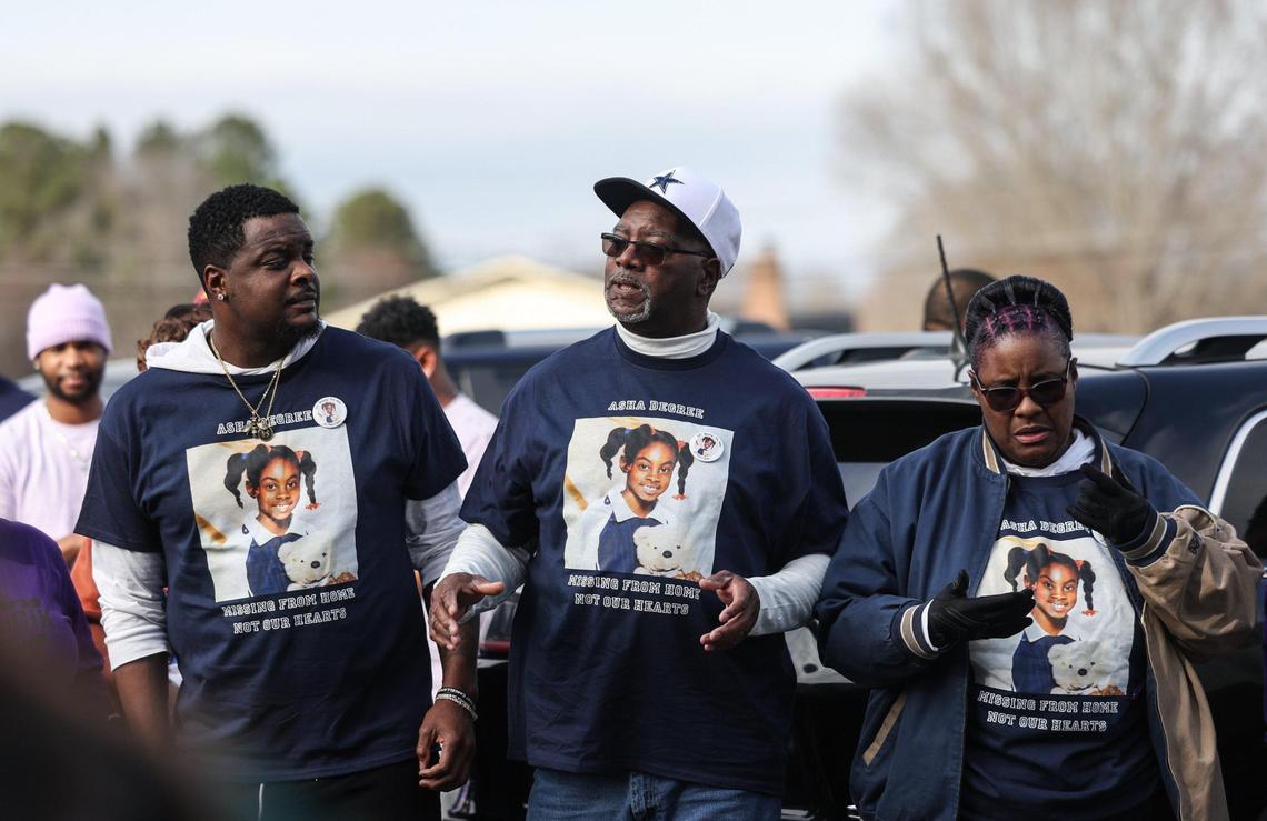 Asha Degree’s father Harold, cenrter, gives instructions to supporters at the march before it begins at Mulls Memorial Baptist Church in Shelby on Saturday, Feb. 8. Mulls Memorial served as a base of operation during the search for the 9-year-old after she went missing on Feb. 14, 2000.