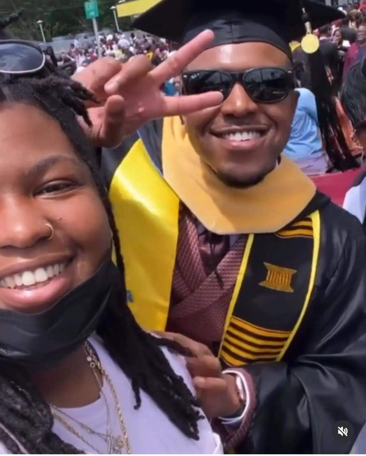 Rogerick Llevon Currie and his sister Melissa at his graduation. Currie received a master’s degree from Johnson C. Smith University, his family said.