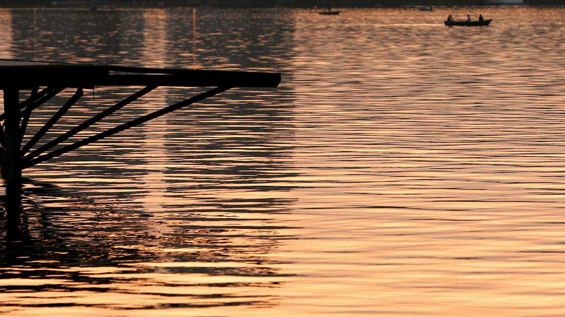 Officials recovered the woman’s body under 8 feet of water after a two-hour search in the lake. (AP Photo/Vadim Ghirda)