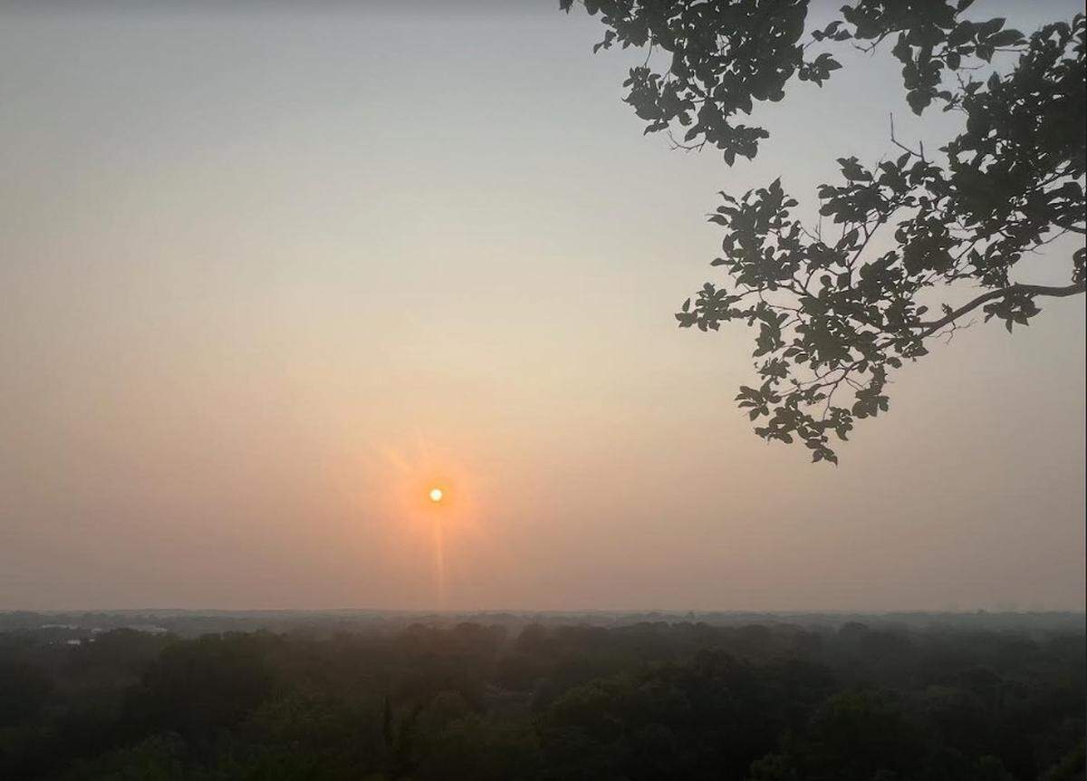 Sunset Monday, July 17, in Charlotte, still shows the haze created from Canadian wildfires. Air quality alerts were again issued Tuesday, July 18.