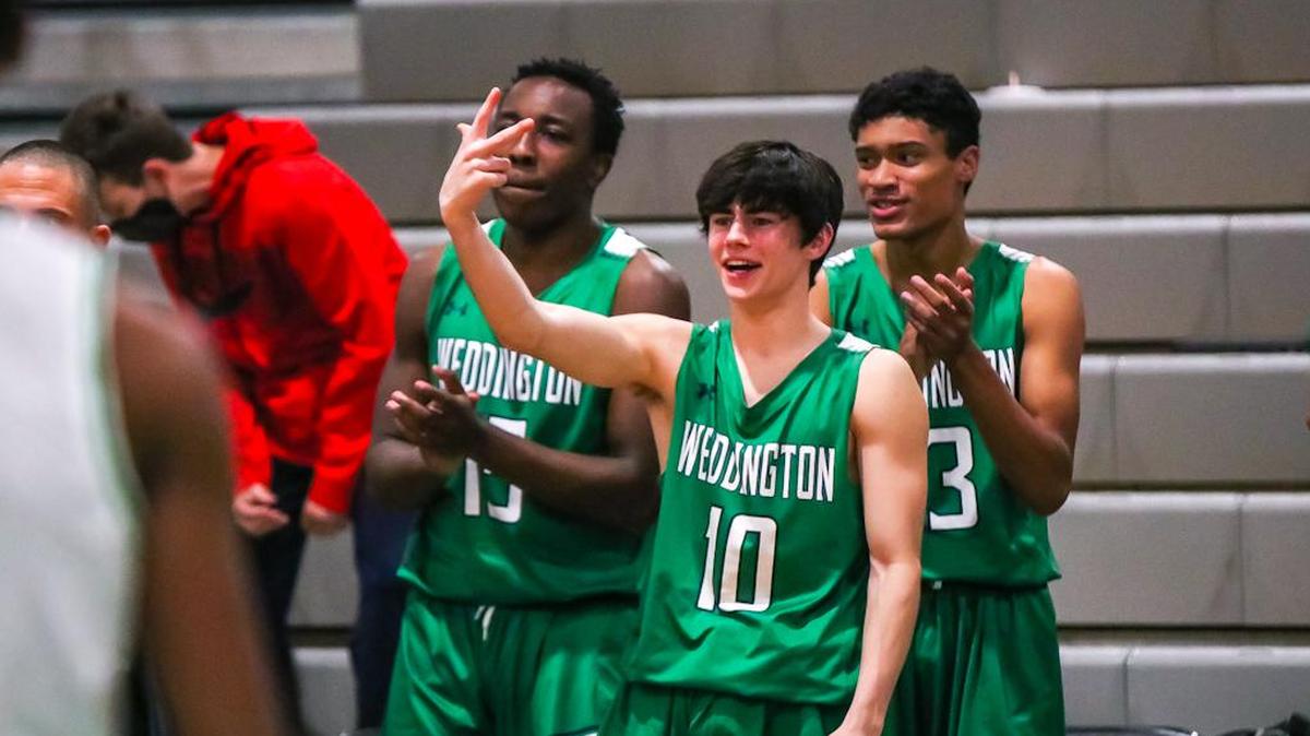 Weddington players celebrate their win over Myers Park Saturday night