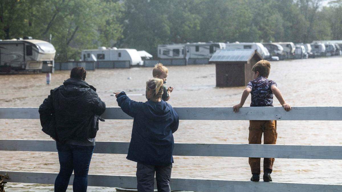 Water from the Tuckasegee River floods the River and Rails RV Park in Whittier on Friday, Sept. 27, 2024, as the remnants of Hurricane Helene move through North Carolina.