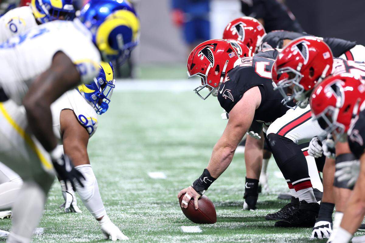 The Atlanta Falcons and Los Angeles Rams line up at the line of scrimmage during the first quarter at Mercedes-Benz Stadium on Dec. 29, 2025, in Atlanta.