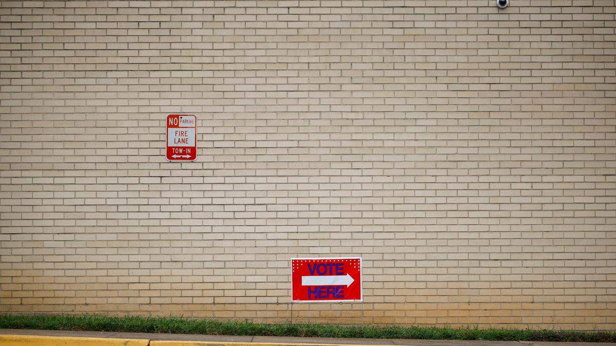 A Vote Here sign greets potential voters at St. Johns Baptist Church in Charlotte, N.C., Tuesday, July 25, 2022.
