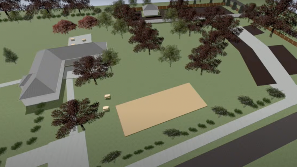 Applicants Jonathan Eury and Katie Carpenter presented renderings of what the Long Creek Family Entertainment site would look like, including a coworking space, community garden and volleyball court.