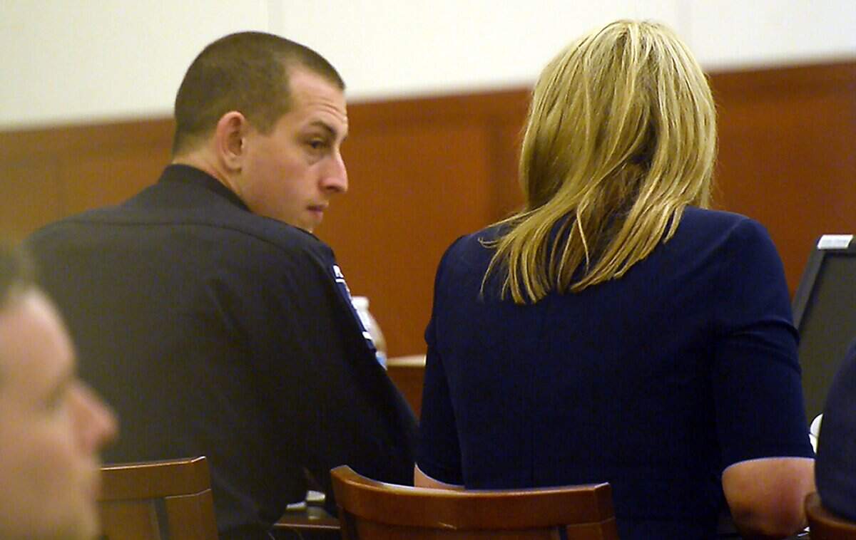 CMPD Officer Jeremy Donaldson listens during opening arguments in the lawsuit against him and Charlotte-Mecklenburg police for the shooting death of Spencer Mims III. On Tuesday, a Mecklenburg jury said the officer's negligence had contributed to Mims' death and awarded the family $100,000.
