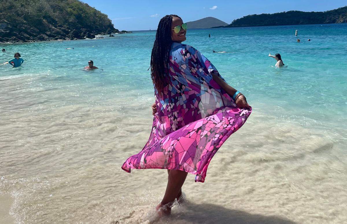 DeAnna Taylor strolls Coki Beach in St. Thomas.
