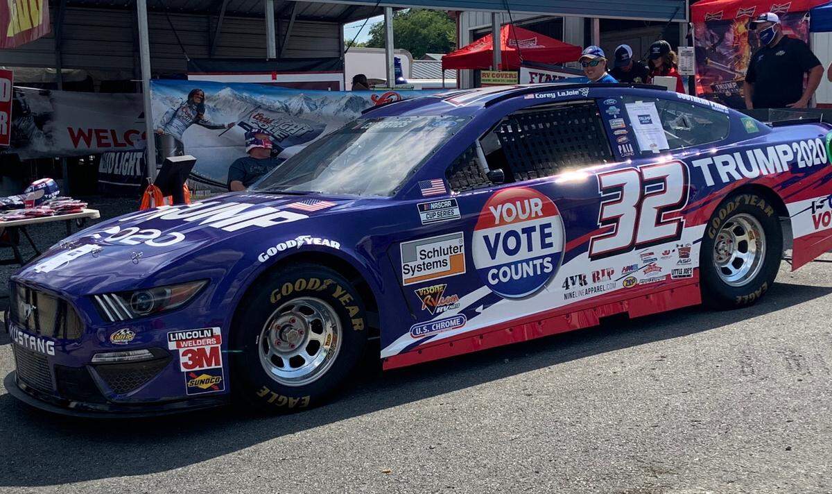 A replica of the “Trump 2020” racecar driven by Corey LaJoie in the NASCAR all-star Open race on Wednesday was placed across the street from Bristol Motor Speedway and drew a constant stream of fans.