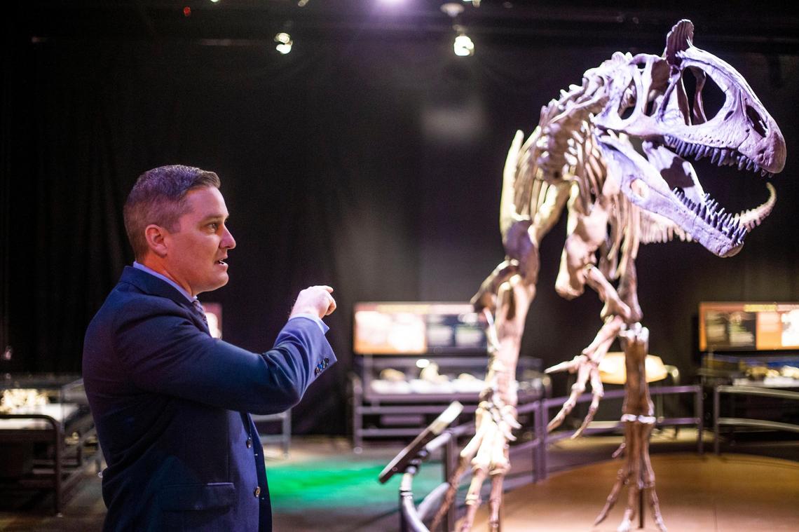 A paleontologist worked on Discovery Place’s “Antarctic Dinosaurs” exhibit early this year.  Officials at the museum expect to announce details soon on how they will safely reopen.