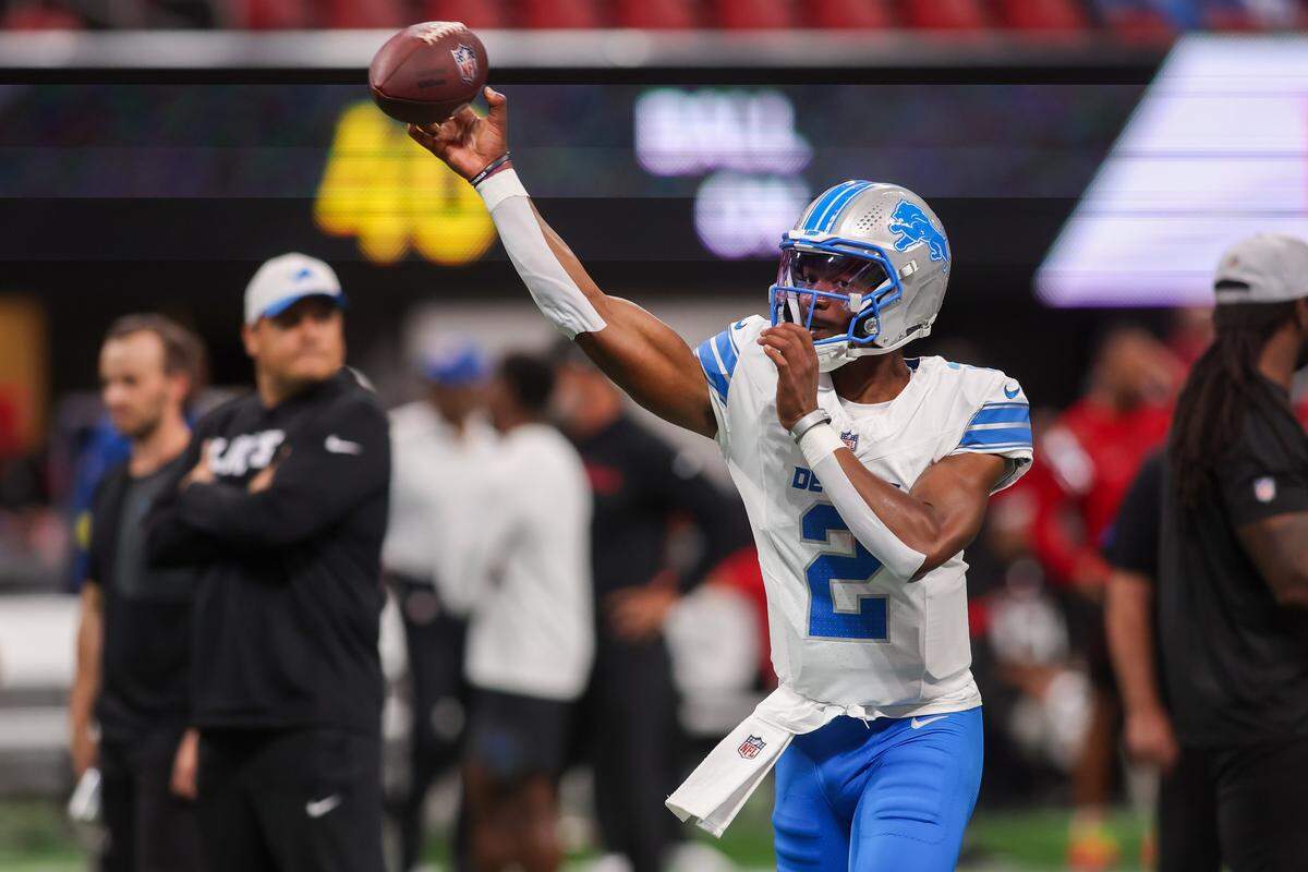 Then-Detroit Lions quarterback Hendon Hooker (2) warms up before a game against the Atlanta Falcons at Mercedes-Benz Stadium. 