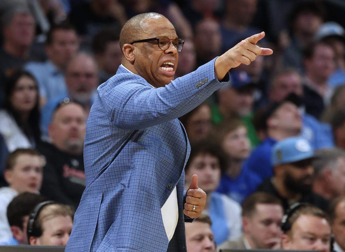 UNC Tar Heels head coach Hubert Davis yells instructions to his team during first-half action against Wagner at Spectrum Center in Charlotte, NC on Thursday, March 21, 2024. The Tar Heels battled Wagner in the First Round of the 2024 NCAA Division 1 Men’s Basketball Championship at Spectrum Center in Charlotte, NC on Thursday, March 21, 2024.