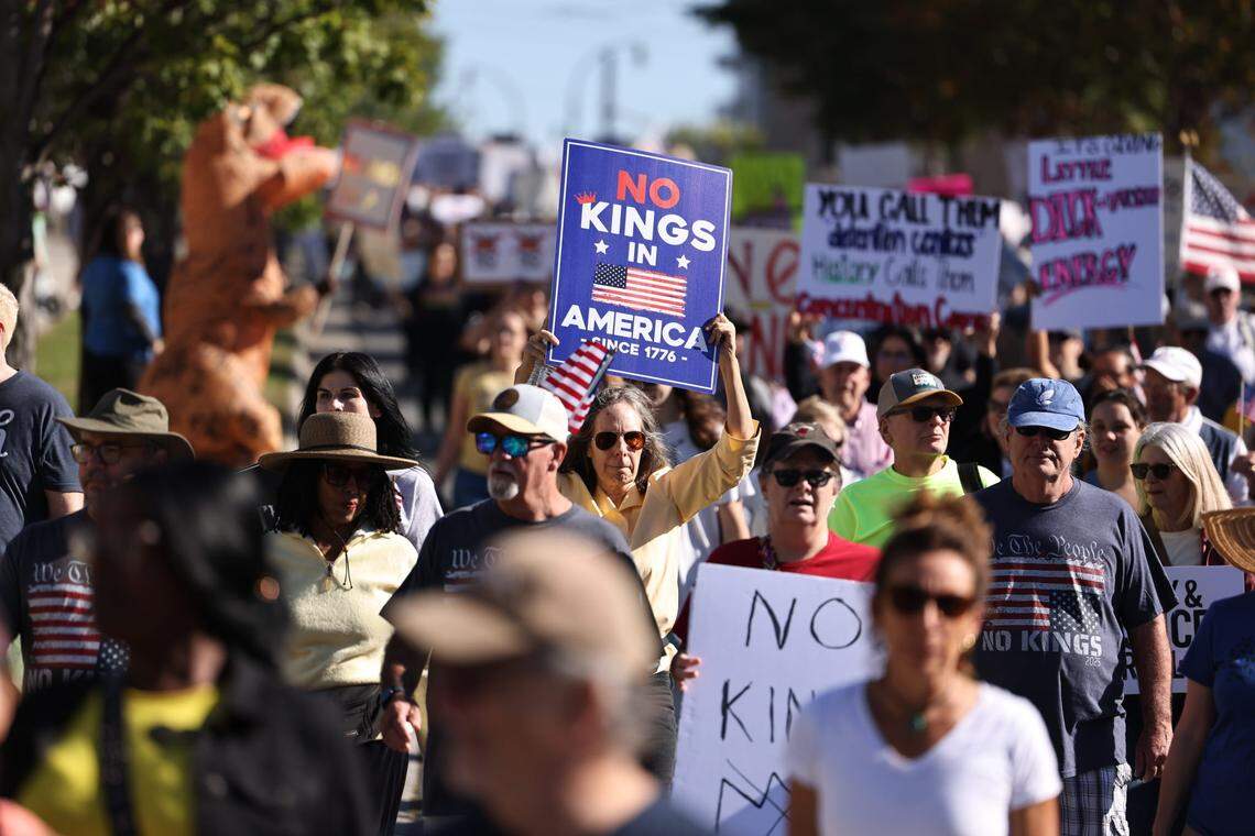 The ‘No Kings’ march makes its way through uptown Charlotte on Saturday, Oct. 18. The protest is part of a national movement to rally against policies enacted by President Donald Trump.